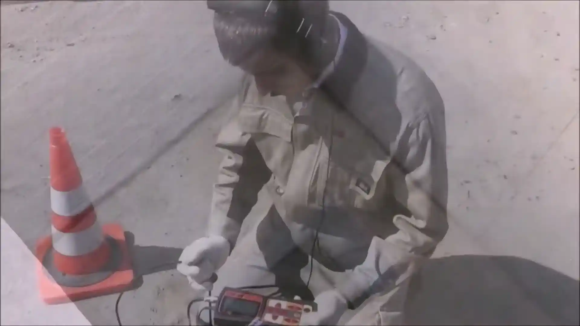 Acoustic leak detection equipment pinpointing a leak through a concrete slab